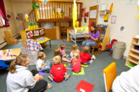 A teacher from the Mayville State Child Development Programs reads to the classroom.